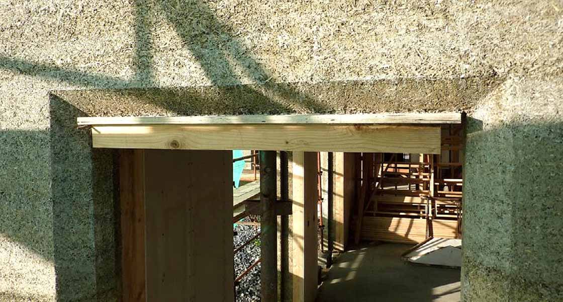 The Tradical Hemcrete is mixed on site with water and poured into timber-shuttering against the timber frame structure.