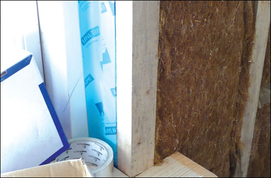 Friction fit hemp wool insulation in the services zone