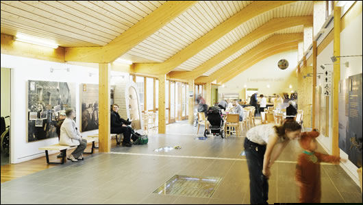 Internal view of the long hall showing the natural ventilation derived roof section and the clarity of the timber structure