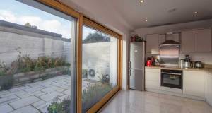 Architect returns to roots with A1 rated 'house of the people'